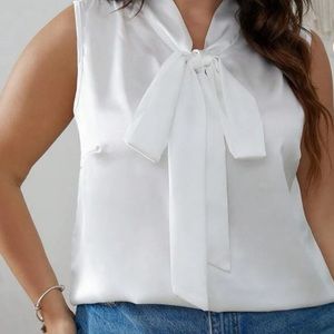 Stunning white silky tie neck sleeveless blouse